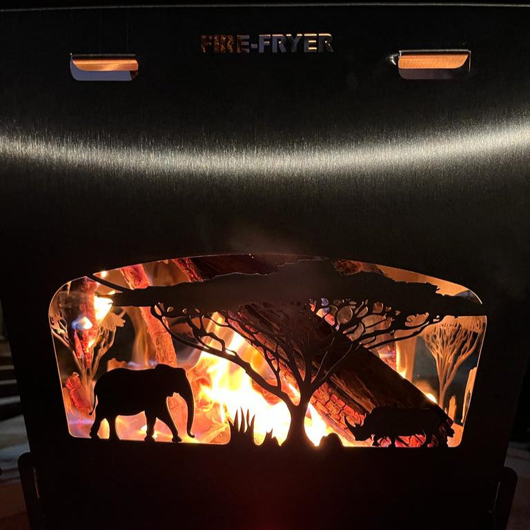 Load image into Gallery viewer, Stainless Steel braai being used in the outdoors